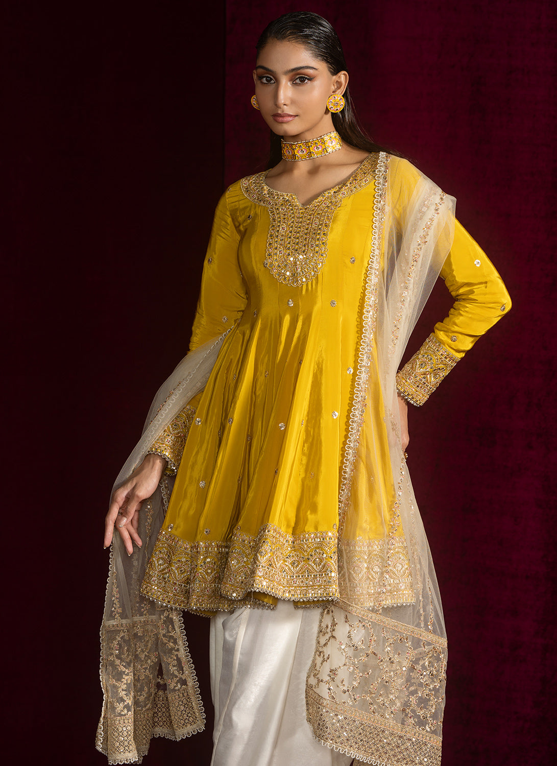 Yellow Peplum Style Embroidered Punjabi Suit