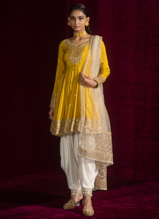 Yellow Peplum Style Embroidered Punjabi Suit