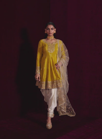 Yellow Peplum Style Embroidered Punjabi Suit