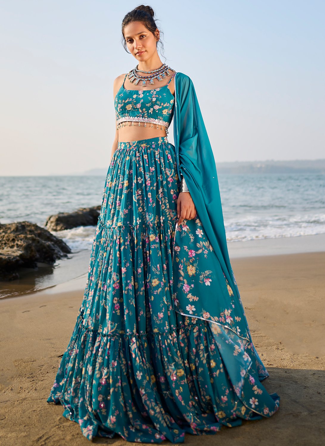 Teal Net Multicolour Thread Embroidered Lehenga Choli Manufacturer Supplier  from Surat India